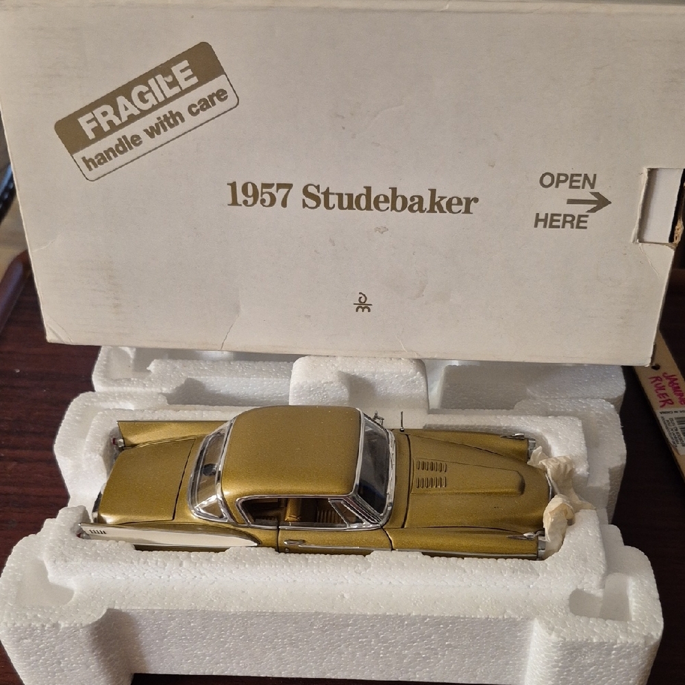 1957 Studebaker Model Car in Gold Nrw Danbury Mint